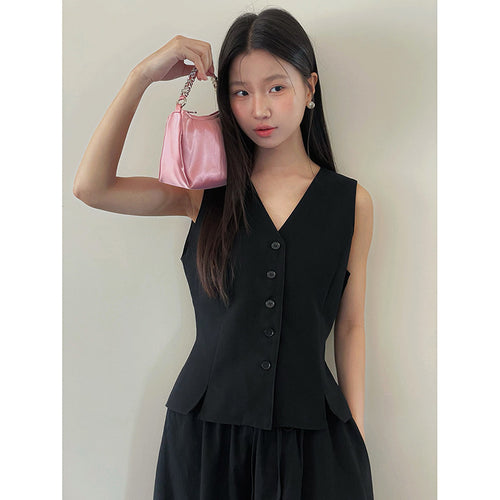 Dame flot vest med dekorativ knapdetalje og elegant drapering Stilla