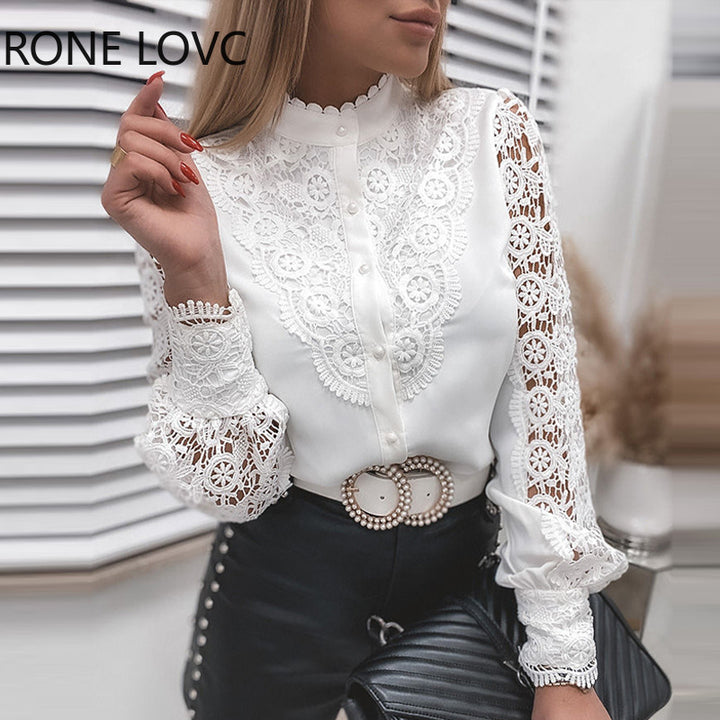 Dame spids bluse med florale ornamenter og lange ærmer Stilla