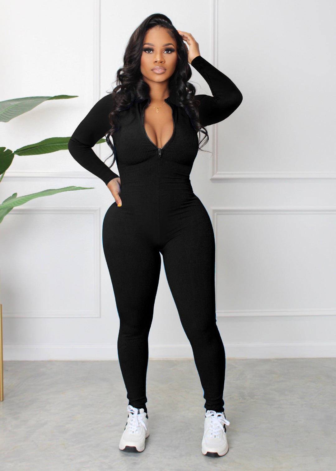 Dame sporty langærmet jumpsuit med lynlås og tætsiddende snit Stilla