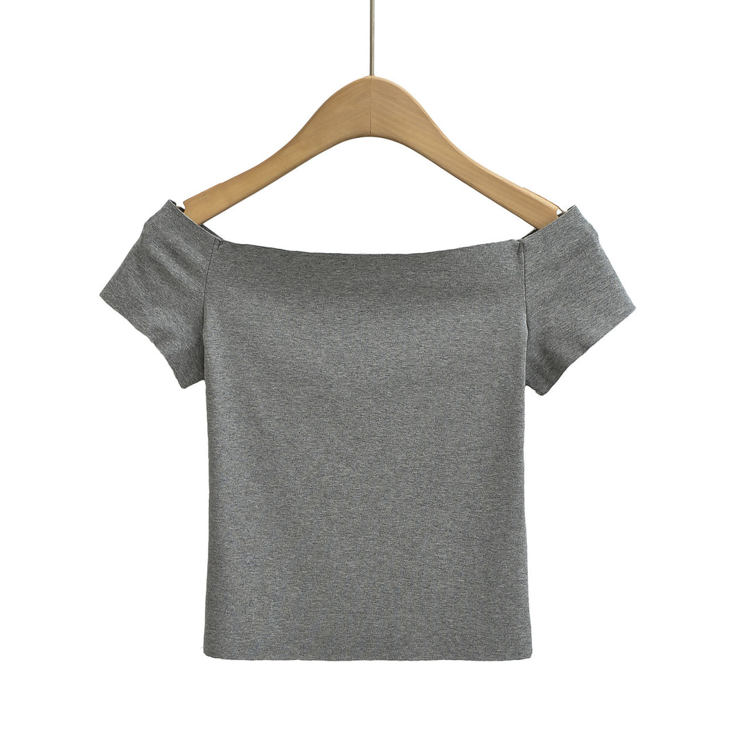 Dame top med smart off-shoulder-design og delikate puffærmer Stilla