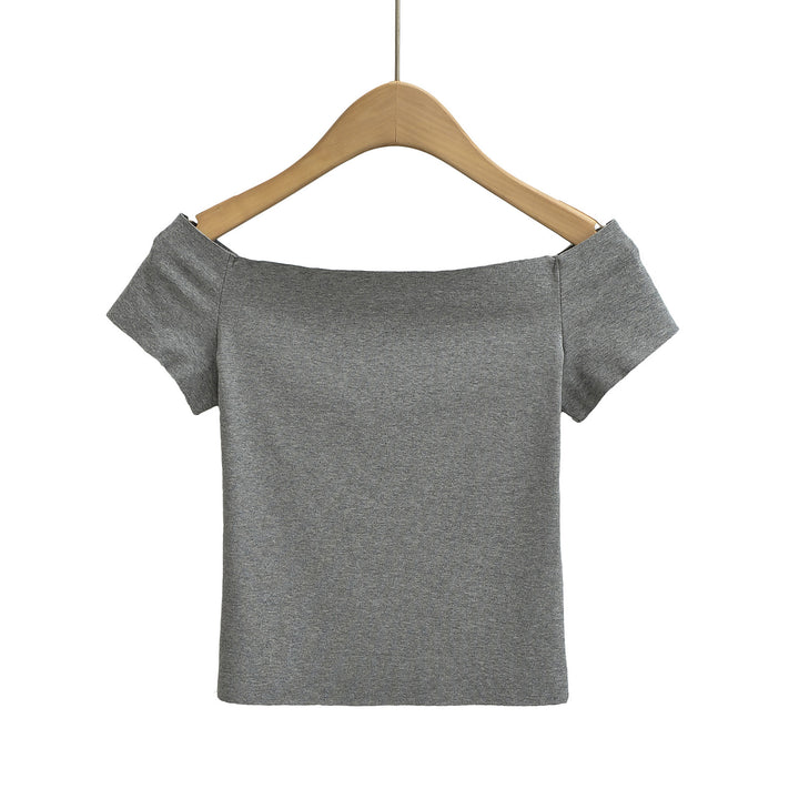 Dame top med smart off-shoulder-design og delikate puffærmer Stilla