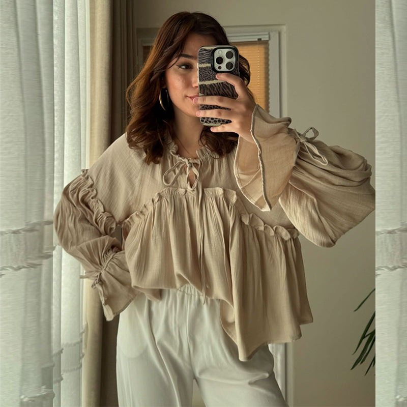 Dame ruskebluse med nostalgisk design og voluminøse ærmer Stilla