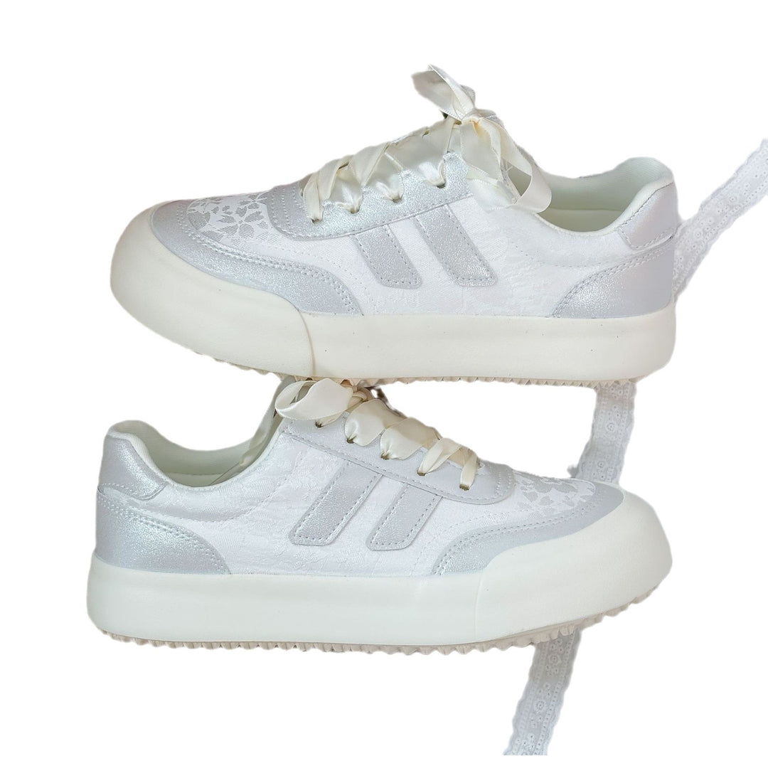 Dame Elegante Sneakers med luksuriøst satin-overmateriale og iøjnefaldende snøresystem Stilla