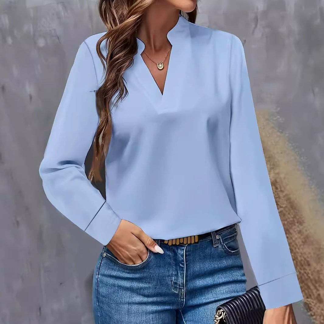 Damebluse med moderne V-halsudskæring og elegante lange ærmer Stilla