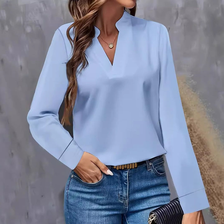Damebluse med moderne V-halsudskæring og elegante lange ærmer Stilla