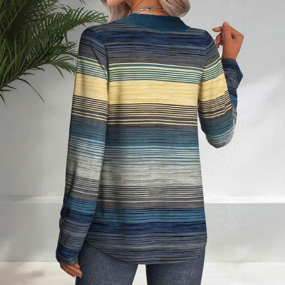 Dame top med kreative striber og dekorative knapper Stilla