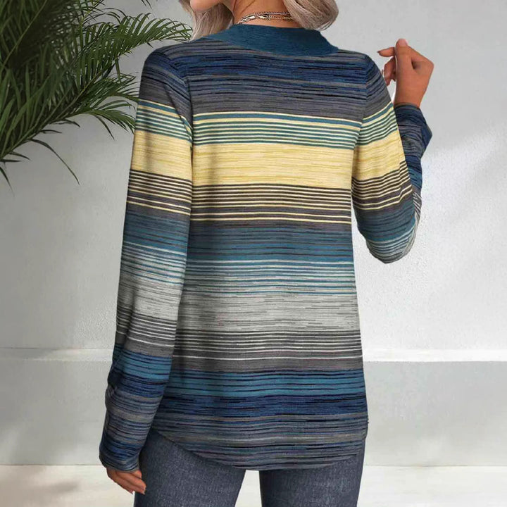 Dame top med kreative striber og dekorative knapper Stilla