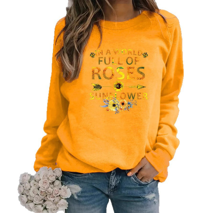 Dame sweatshirt med inspirerende design og blomsterdekoration Stilla