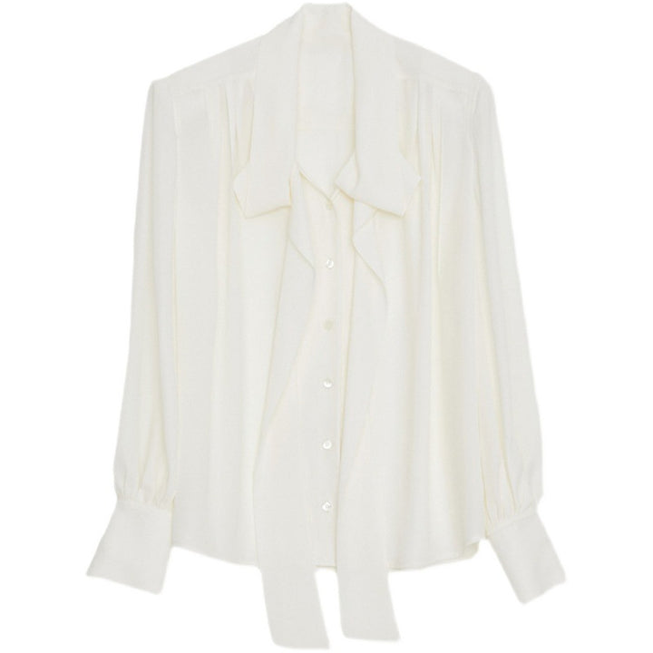 Dame elegant bluse med sidelæns bindebånd og raffineret knapliste Stilla