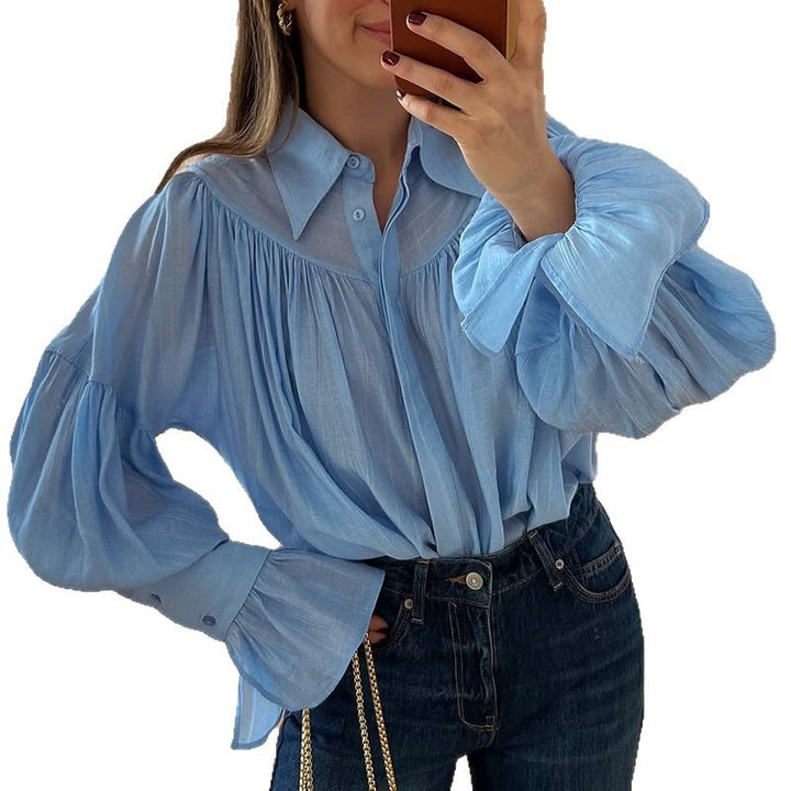 Dame oversized bluse med voluminøse ærmer og elegant knaplukning Stilla