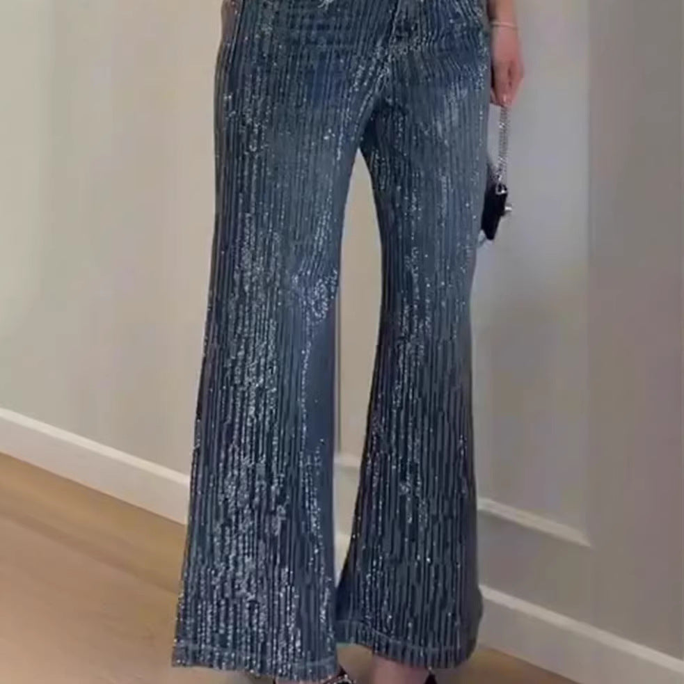 Kvindernes glitrende bredskårede jeans med elegant struktur Stilla