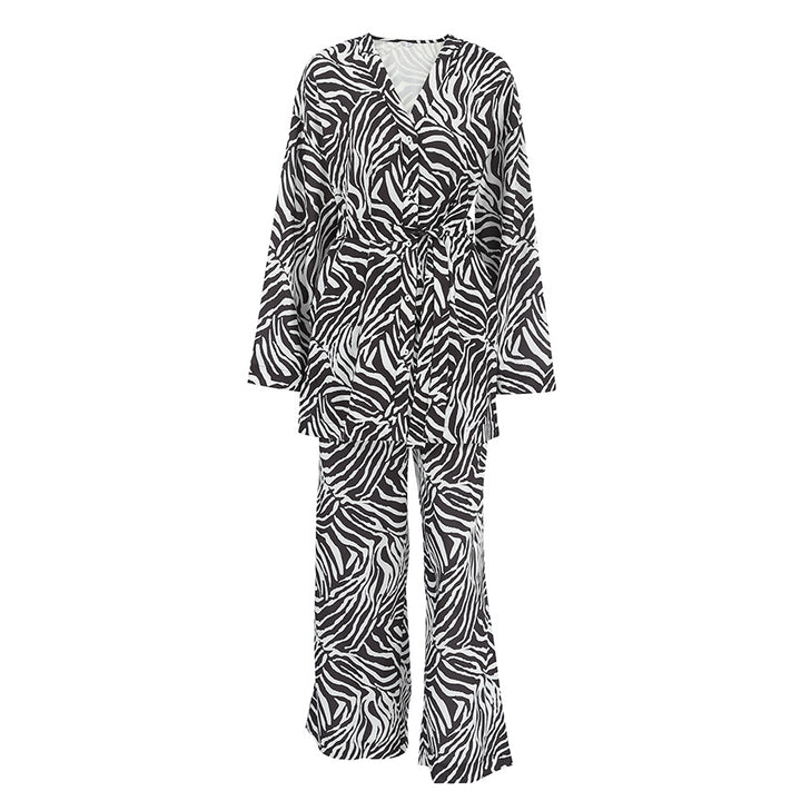 Dame elegant ensemble med zebra-print og talje-knude Stilla
