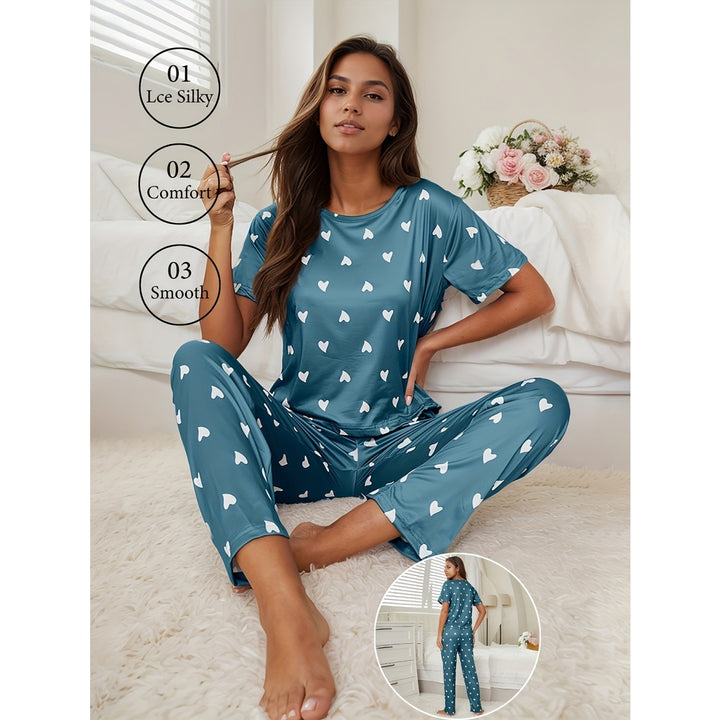 Dame pyjamasæt med blødt materiale og legeligt hjerte design Stilla