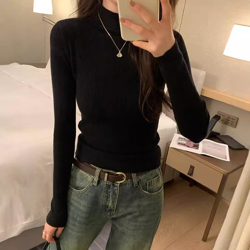 Dame finstrikket sweater i et moderne snit med høj krave Stilla
