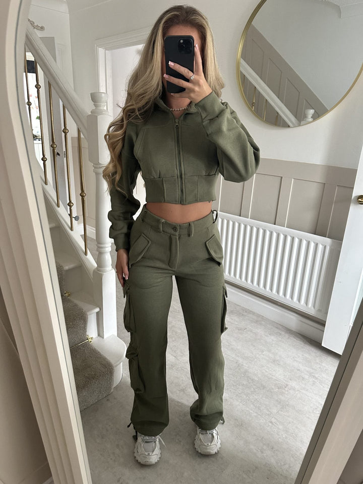 Kvinders fashionable cropped fritids sæt med funktionel lynlås og praktiske lommer