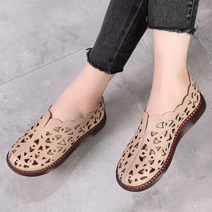 Dame åndbar og moderigtige slippers med elegant snit og gennembrudt design Stilla