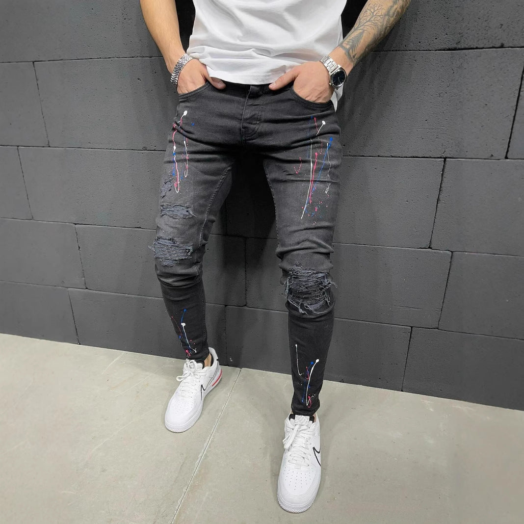 Herrer jeans i used-look med kreative farvesprøjt Stilla