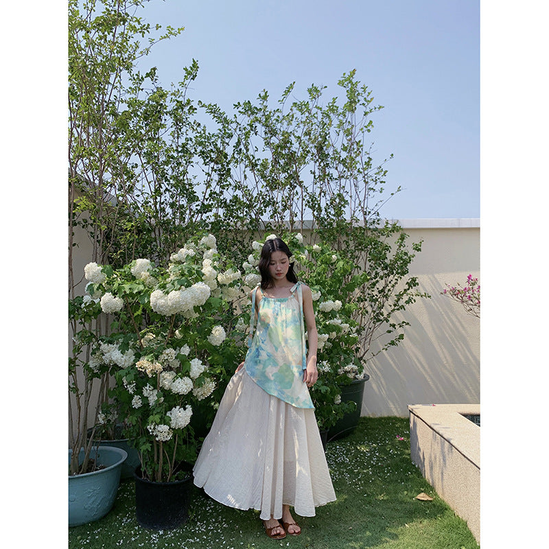 Dame ærmeløst top med blomsterdesign og fine bindebånd Stilla