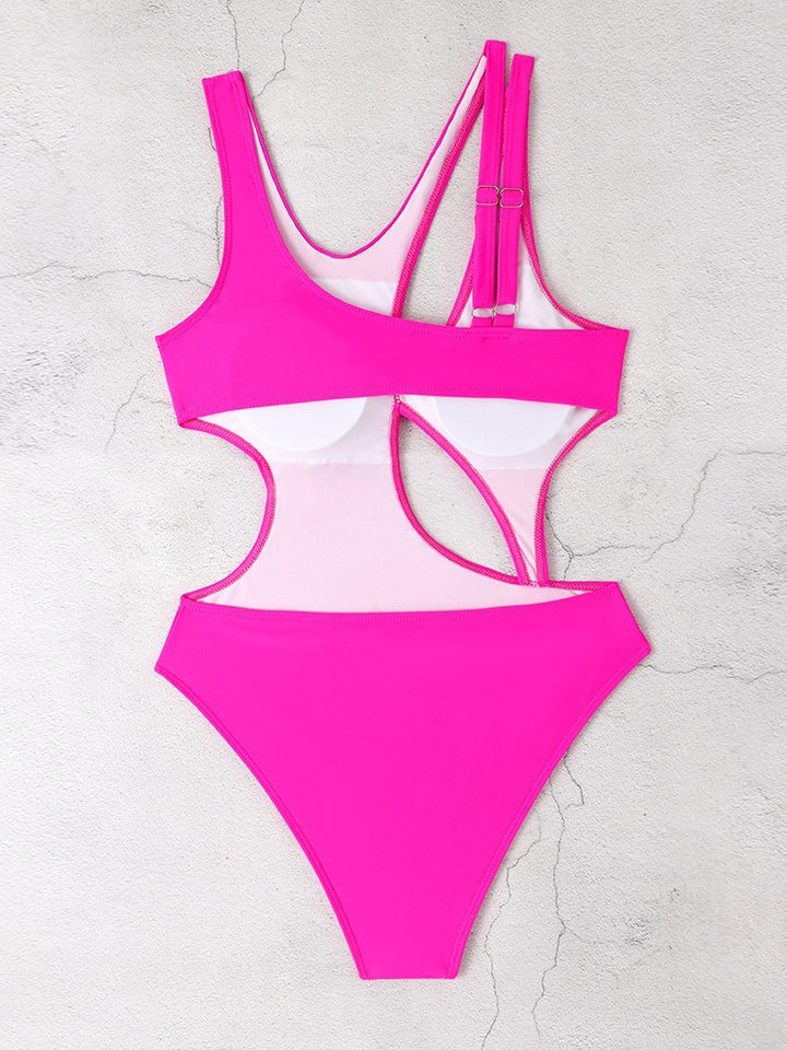Dame én-delt badedragt med innovativt cut-out-design og sporty stropper Stilla