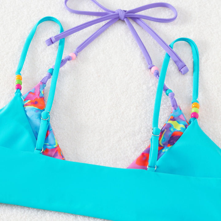Dame bikini-sæt med spændende blomsterdesign og klassiske trekantkopper Stilla