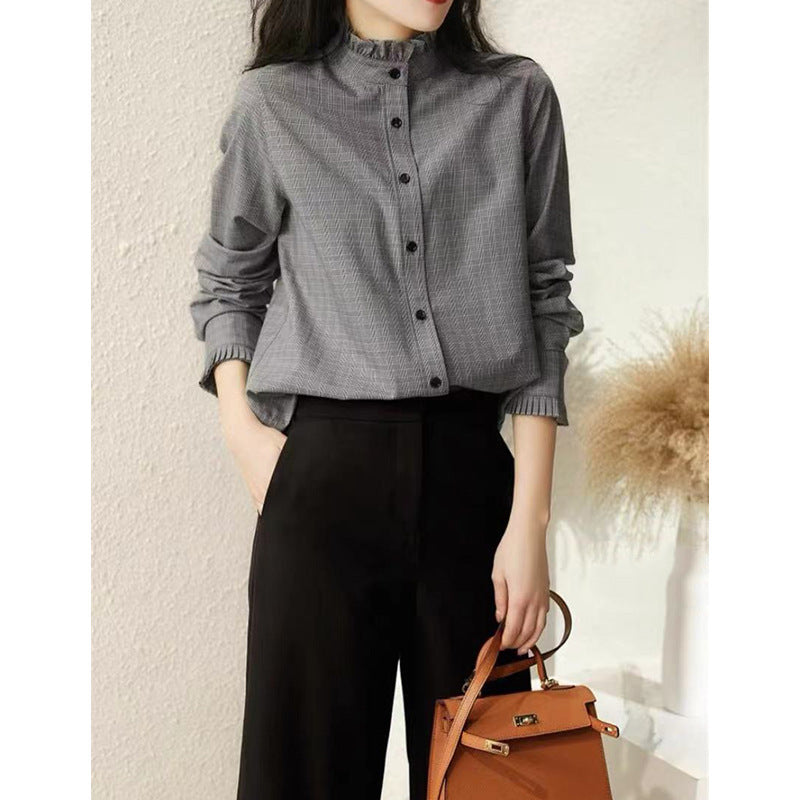 Damebluse med ståkrave og struktureret design Stilla