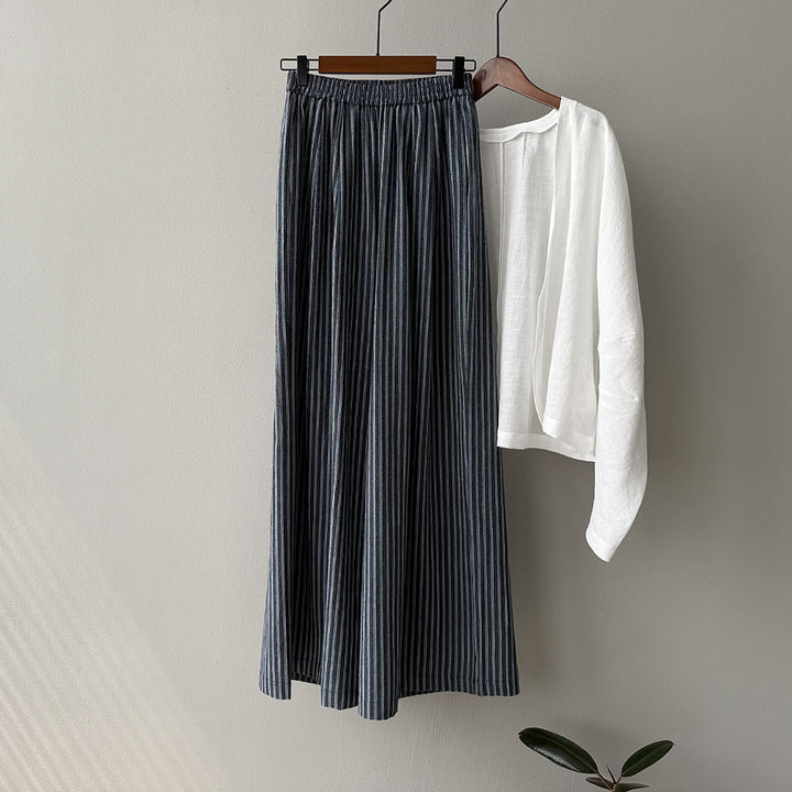 Dame maxiskirts lavet af let, åndbart materiale med elegant plissering Stilla