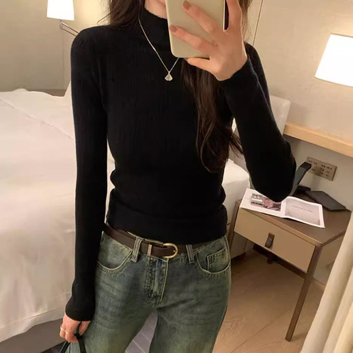Dame finstrikket sweater i et moderne snit med høj krave Stilla
