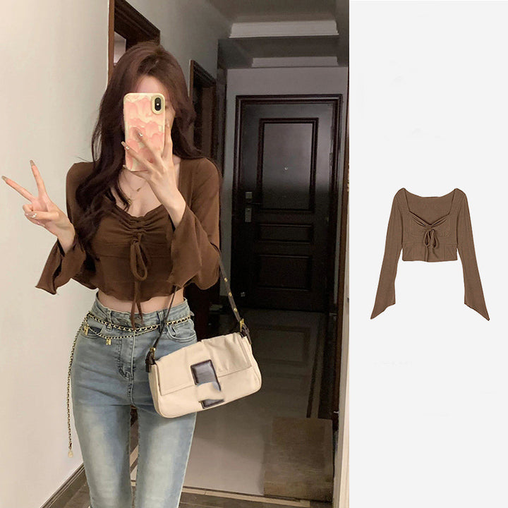 Kvindernes cropped top med raffineret knude og bred ærme Skovae