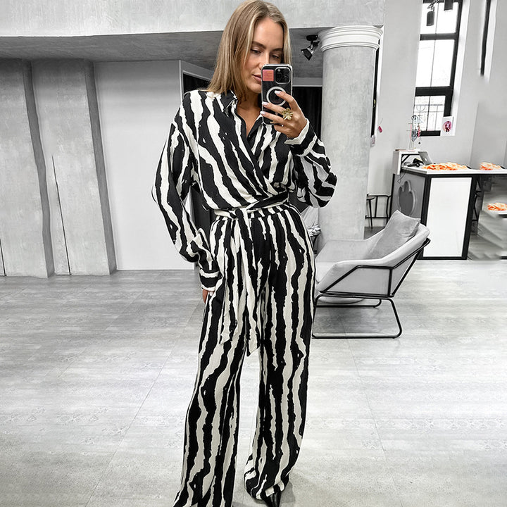 Dame elegant jumpsuit med asymmetrisk krave og sidelænbånd Stilla