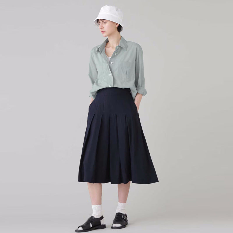 Dame klassisk bomuldsbluse med praktiske brystlommer og elegant snit Stilla