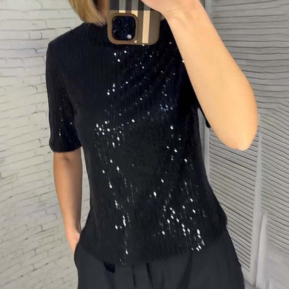 Dame kortærmet overdel med glitrende pailette-detaljer og moderne ribdesignet Stilla