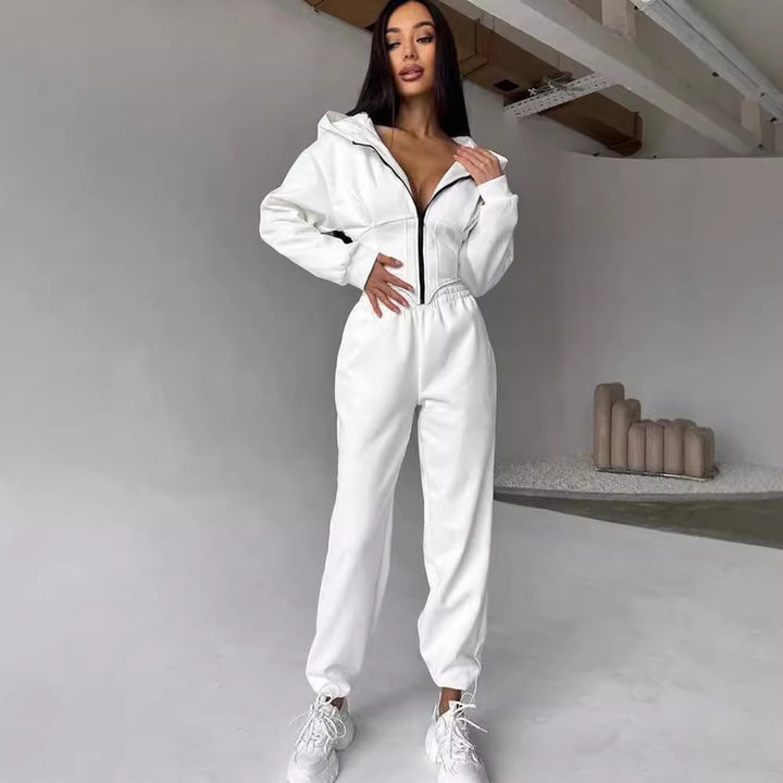 Dame moderat jumpsuit med tætsiddende design og innovativ lynlås Stilla