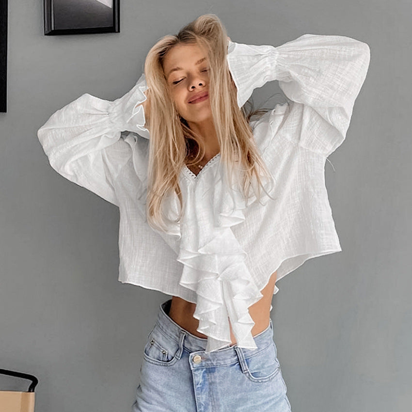 Dame rynket bluse med voluminøse ærmer og elegant afslutning Stilla