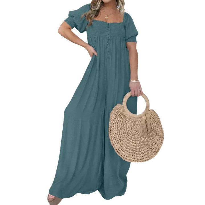 Dame afslappet jumpsuit med smalle stropper og knapdetalje Stilla