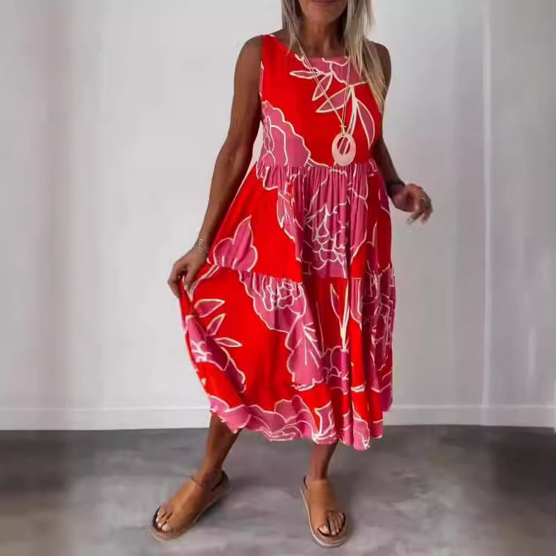 Dame Midikjole med asymmetrisk kant og blomstret print Stilla
