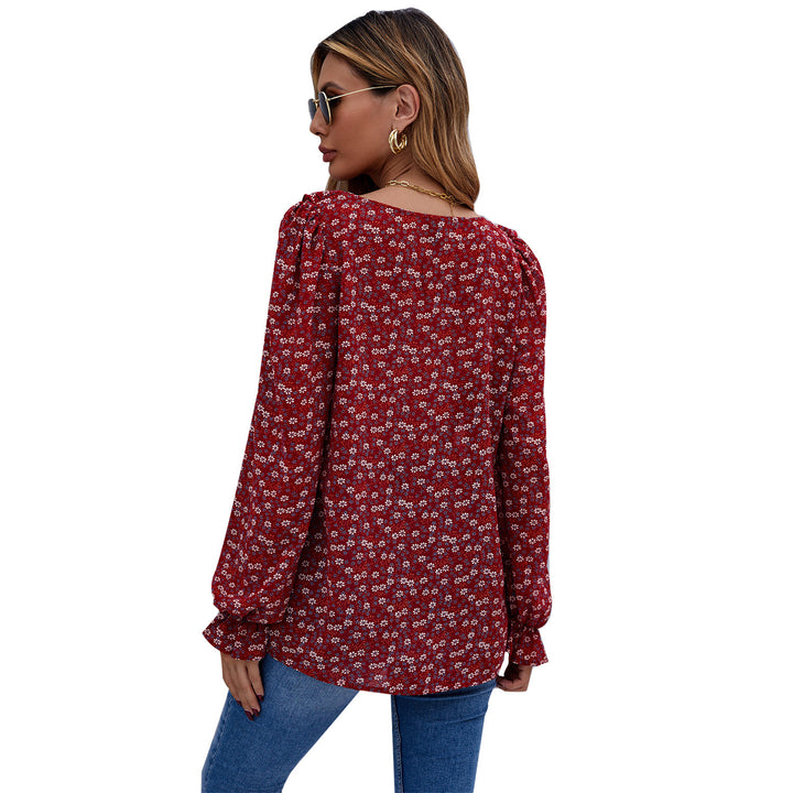 Damebluse med flæsedetaljer og blomster mønster Stilla