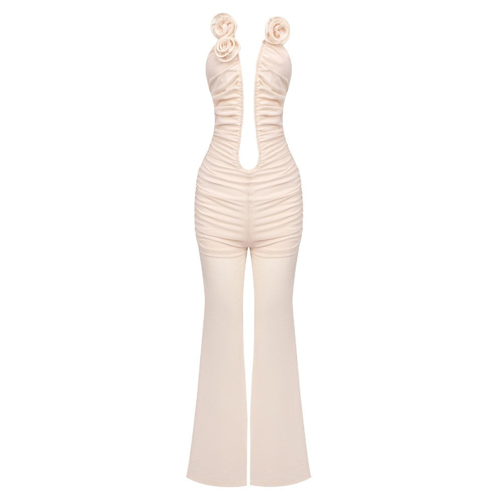 Dame jumpsuit med dyb udskæring og florale accenter Skovae
