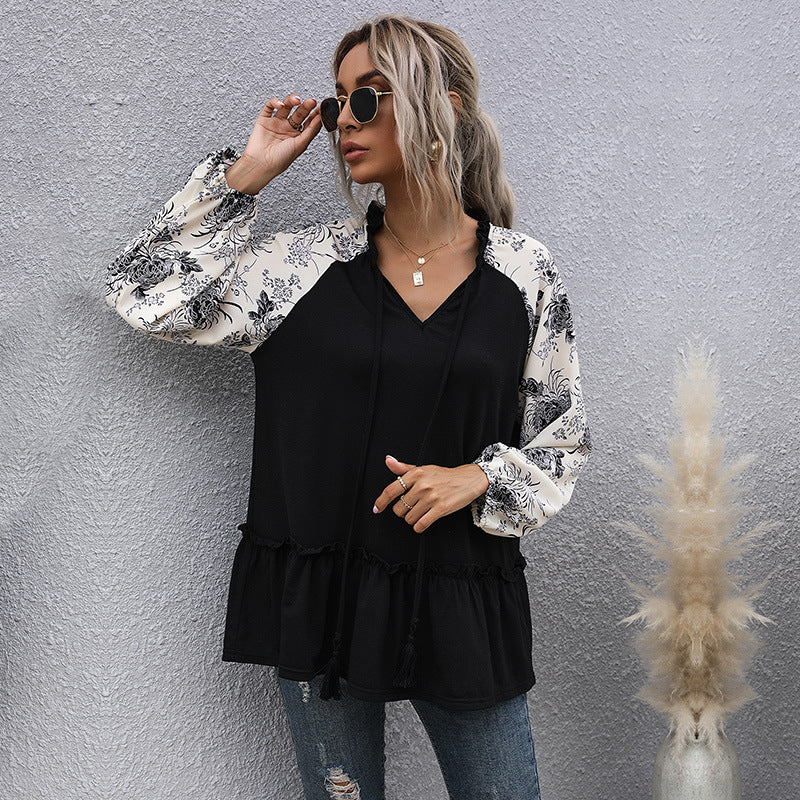 Dame hoodie med blomsterdesign og peplum snit Skovae