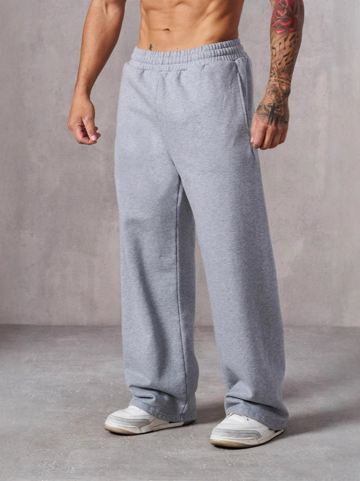 Herre Baggy Joggingbukser med Elastisk Talje og Sidetasker Skovae
