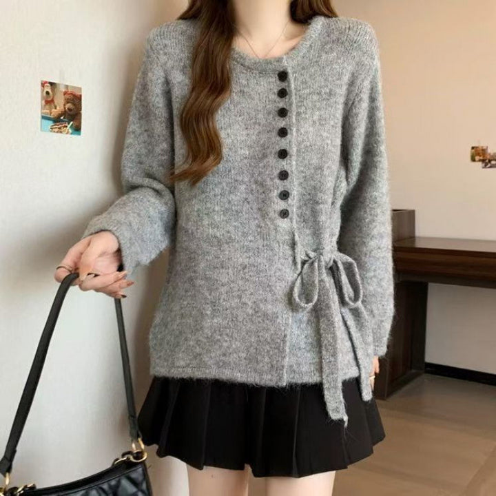 Kvinders stilfulde cardigan med fashionable knapdetaljer og bælte Stilla