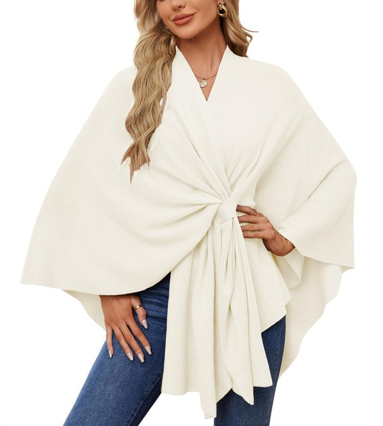 Dame elegant strikkeponcho med raffinerede draperinger og taljebælte Stilla