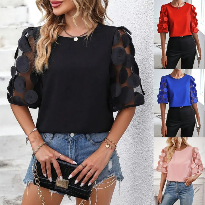 Dame moderigtig bluse med transparente puffærmer og runde applikationer Stilla