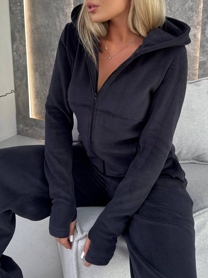 Kvinders fleece jumpsuit med høj krave og praktiske lommer