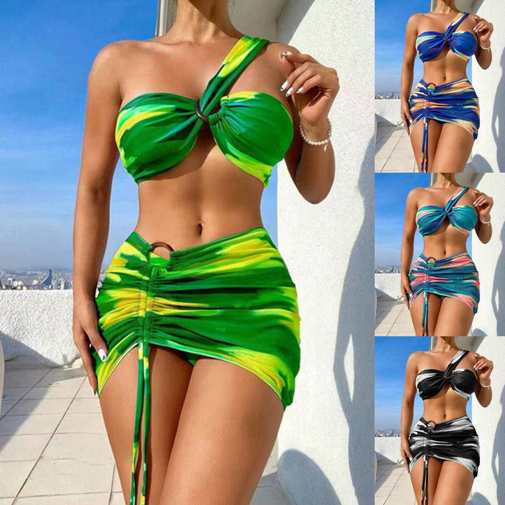 Dame bikini-sæt med moderne indpakningsskørt og justerbar top Stilla