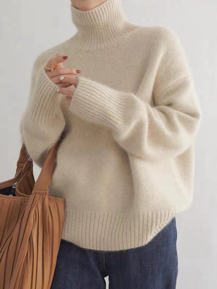 Kvinders hyggelige turtle neck sweater lavet af fin uld Stilla