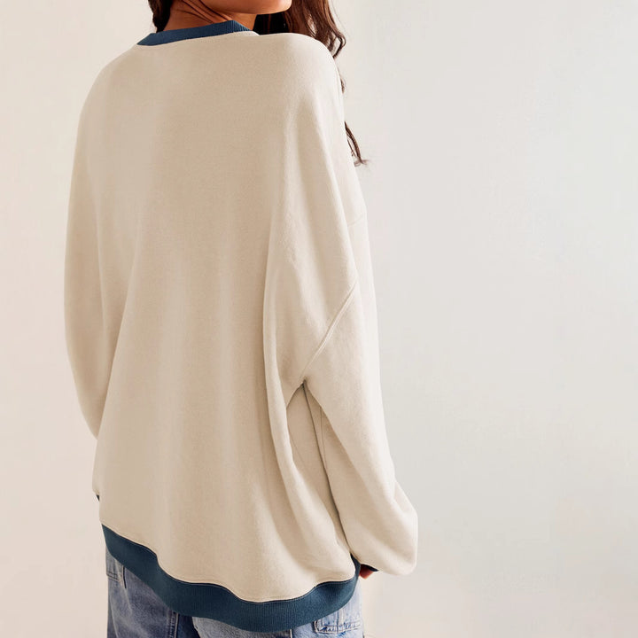 Dame avslappet sweatshirt med dyb V-udskæring og kontrastdetaljer Stilla
