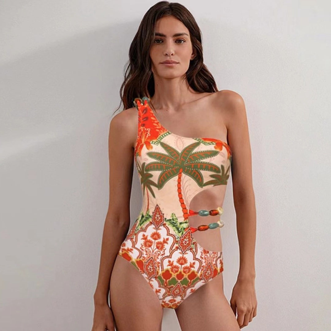 Dame en-delt badedragt med moderigtig cut-out og matchende strandnederdel Skovae