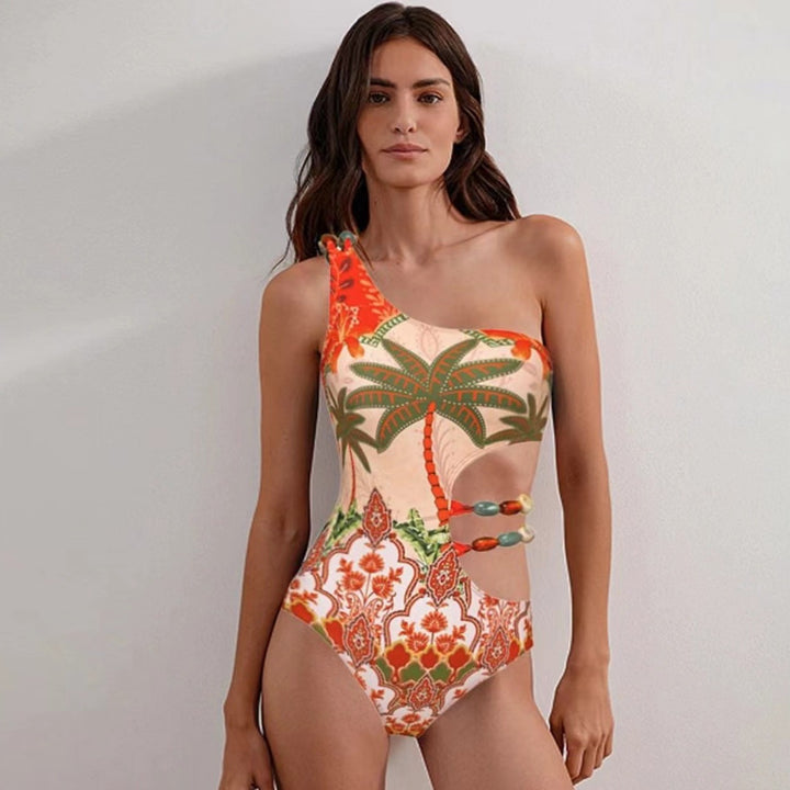 Dame en-delt badedragt med moderigtig cut-out og matchende strandnederdel Skovae