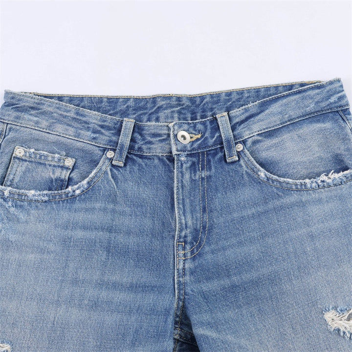 Dame flared jeans i brugt look med frynser og destroyed-detaljer Skovae