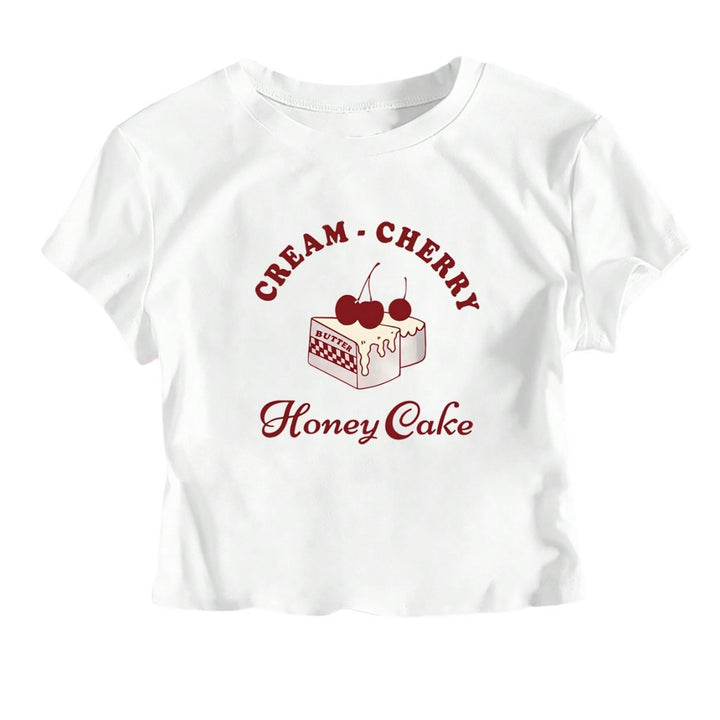 Dame Crop-T-Shirt med kreativ dessertmotiv og moderne snit Skovae